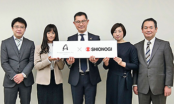 合意書を締結した両社の社員